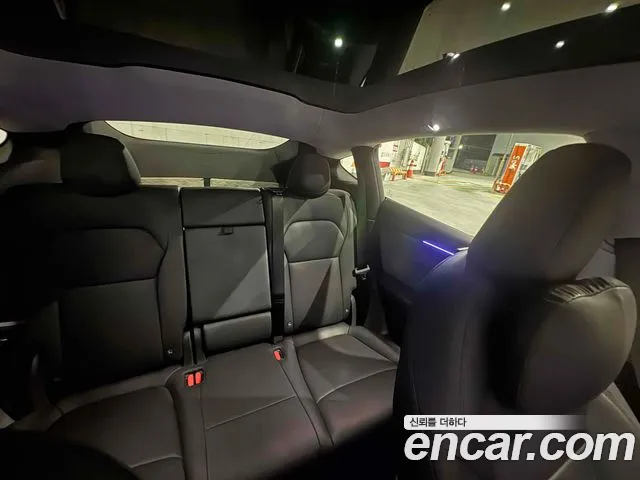 Tesla Model Y — Фото автомобиля 9