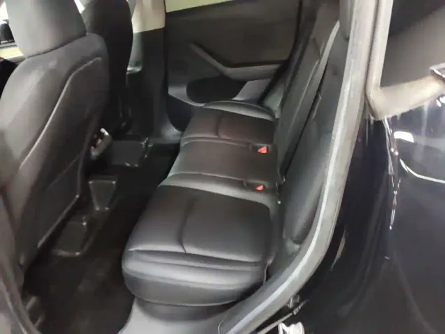 Tesla Model Y — Фото автомобиля 16