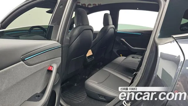 Tesla Model Y — Фото автомобиля 11