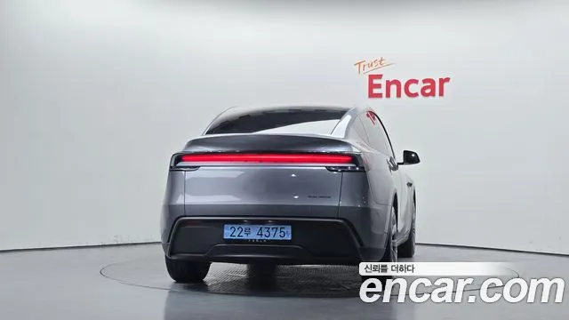 Tesla Model Y — Фото автомобиля 4