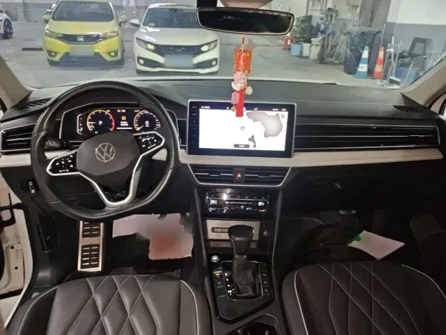 Volkswagen Tiguan L — Фото автомобиля 9