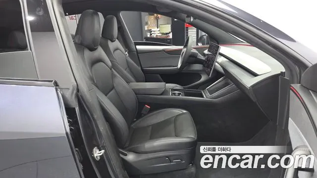 Tesla Model Y — Фото автомобиля 11