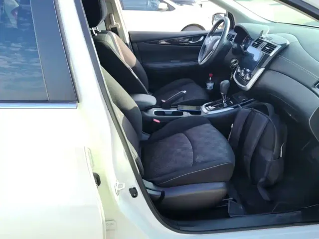 Nissan Tiida — Фото автомобиля 24