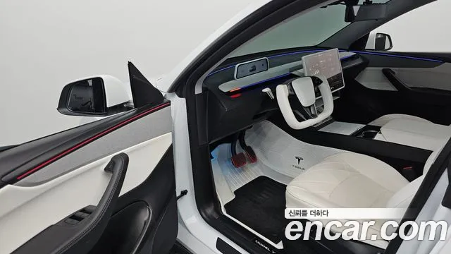 Tesla Model Y — Фото автомобиля 10