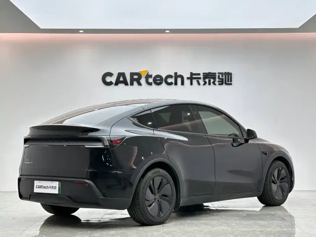 Tesla Model Y — Фото автомобиля 5
