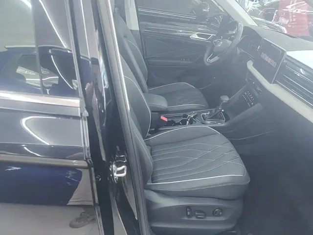 Volkswagen Tiguan L — Фото автомобиля 24