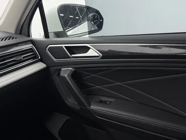 Volkswagen Tiguan L — Фото автомобиля 11