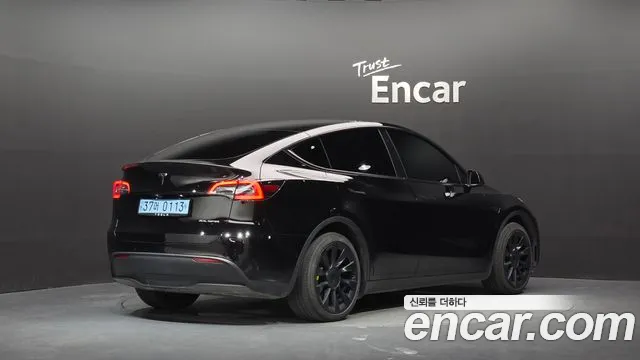 Tesla Model Y — Фото автомобиля 2