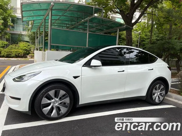 Tesla Model Y — Фото автомобиля 4