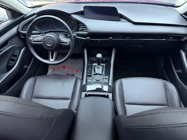 Mazda Axela — Фото автомобиля 10