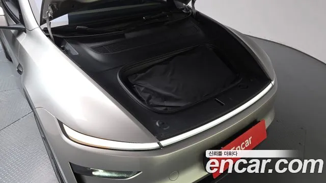 Tesla Model Y — Фото автомобиля 9