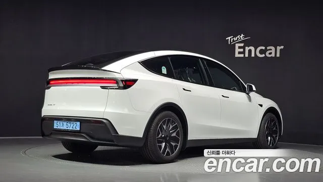 Tesla Model Y — Фото автомобиля 2