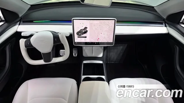 Tesla Model Y — Фото автомобиля 10
