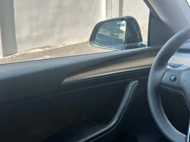 Tesla Model Y — Фото автомобиля 13