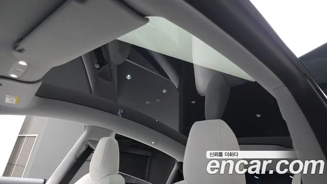 Tesla Model Y — Фото автомобиля 15