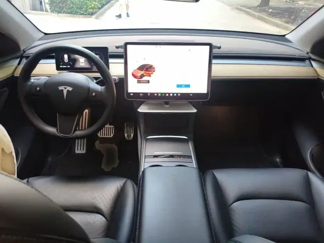 Tesla Model Y — Фото автомобиля 5