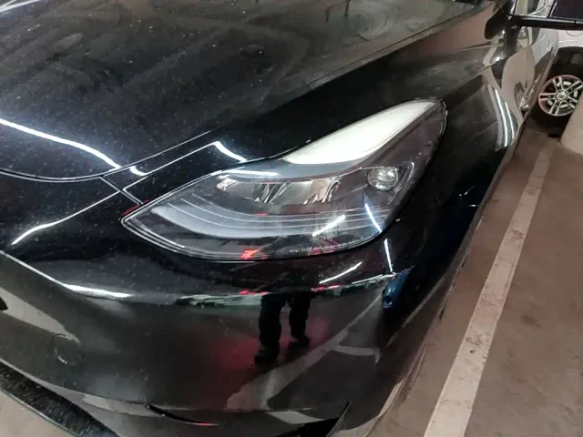 Tesla Model Y — Фото автомобиля 23