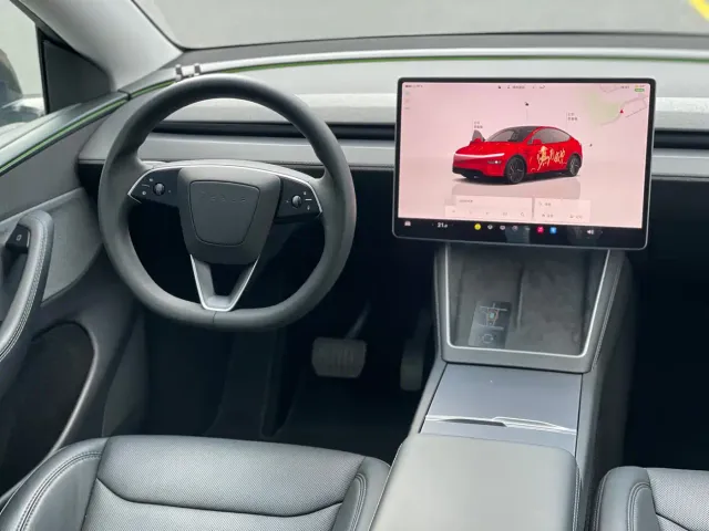 Tesla Model Y — Фото автомобиля 12