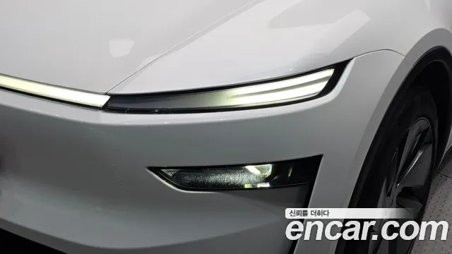 Tesla Model Y — Фото автомобиля 7