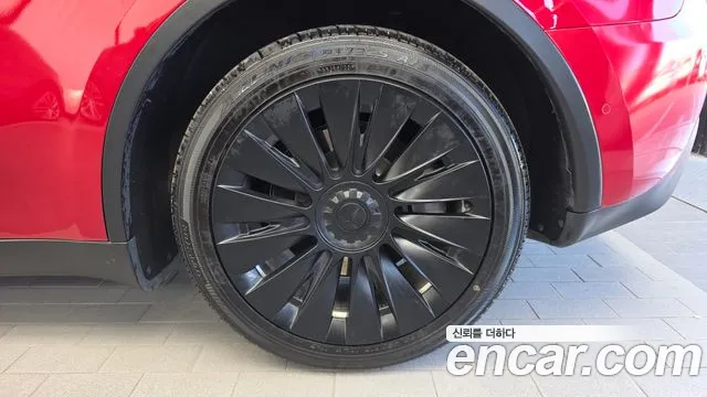 Tesla Model Y — Фото автомобиля 6