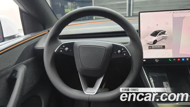 Tesla Model Y — Фото автомобиля 19