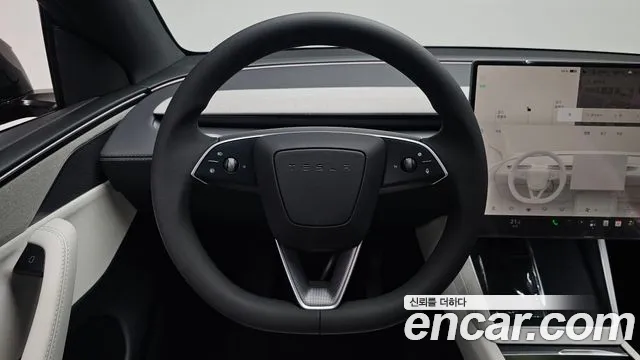 Tesla Model Y — Фото автомобиля 12