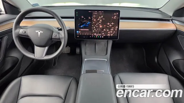 Tesla Model 3 — Фото автомобиля 10