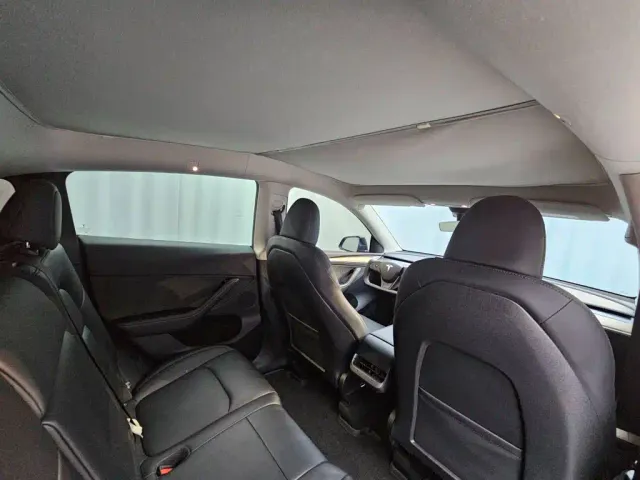 Tesla Model Y — Фото автомобиля 21