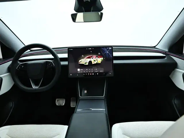 Tesla Model Y — Фото автомобиля 14