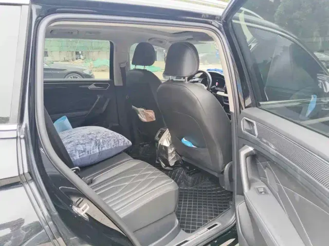 Volkswagen Tiguan L — Фото автомобиля 11