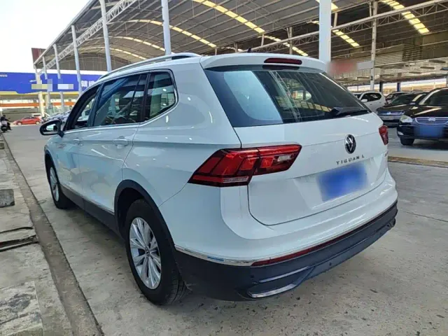 Volkswagen Tiguan L — Фото автомобиля 4
