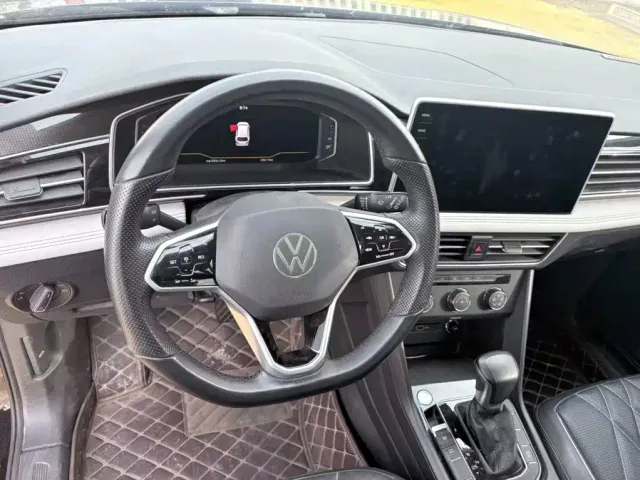 Volkswagen Tiguan L — Фото автомобиля 6