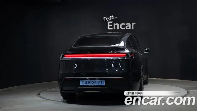 Tesla Model Y — Фото автомобиля 4