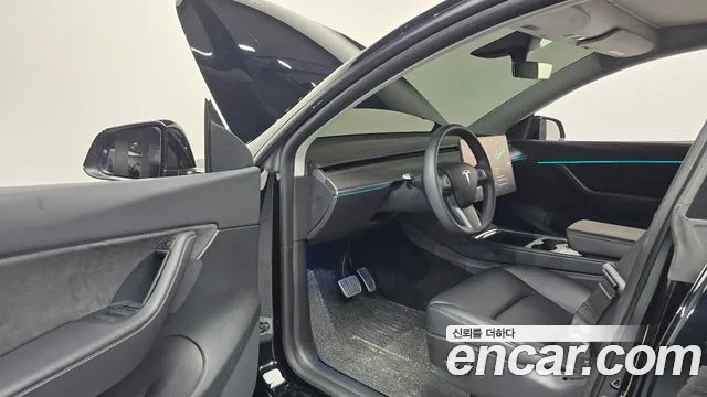 Tesla Model Y — Фото автомобиля 10