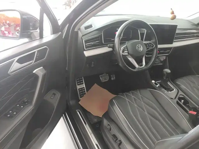 Volkswagen Tiguan L — Фото автомобиля 15