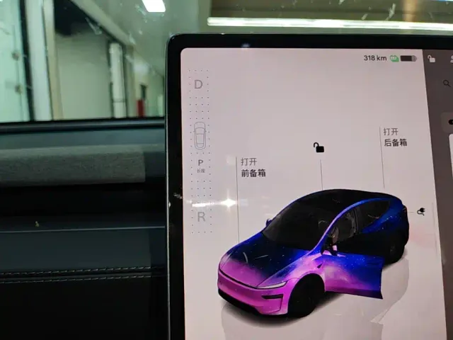 Tesla Model Y — Фото автомобиля 13
