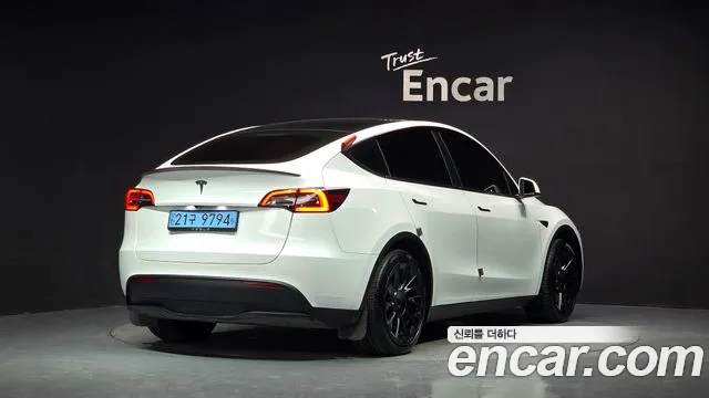 Tesla Model Y — Фото автомобиля 2