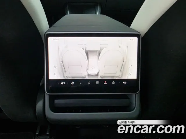 Tesla Model Y — Фото автомобиля 14