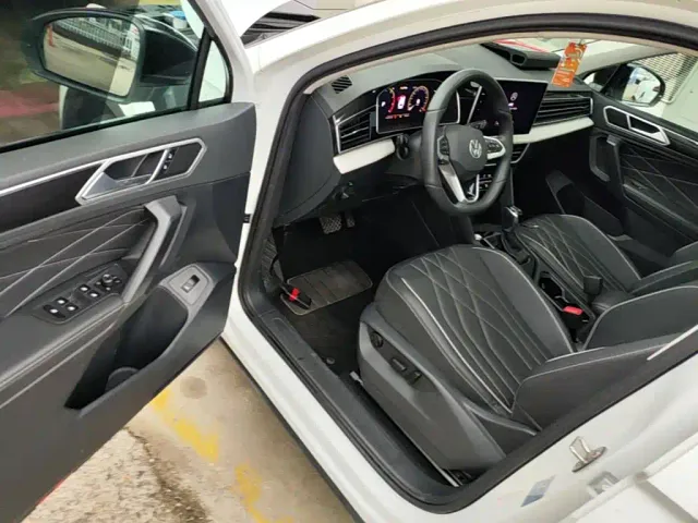 Volkswagen Tiguan L — Фото автомобиля 15