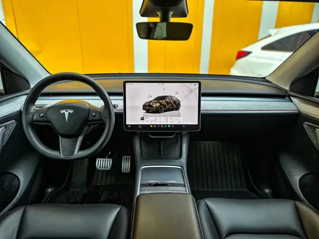 Tesla Model Y — Фото автомобиля 7