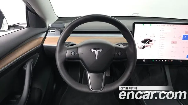 Tesla Model 3 — Фото автомобиля 11