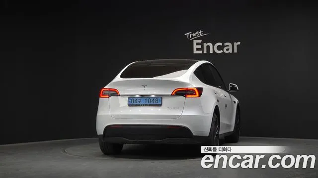 Tesla Model Y — Фото автомобиля 4