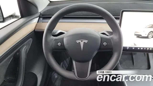 Tesla Model Y — Фото автомобиля 10