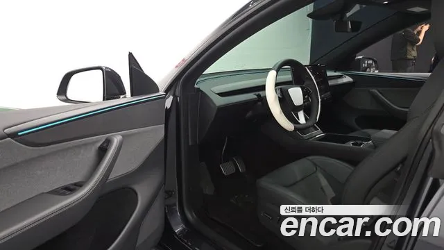 Tesla Model Y — Фото автомобиля 15