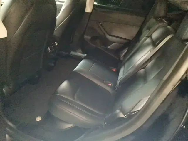 Tesla Model Y — Фото автомобиля 16
