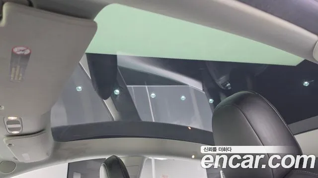 Tesla Model Y — Фото автомобиля 17