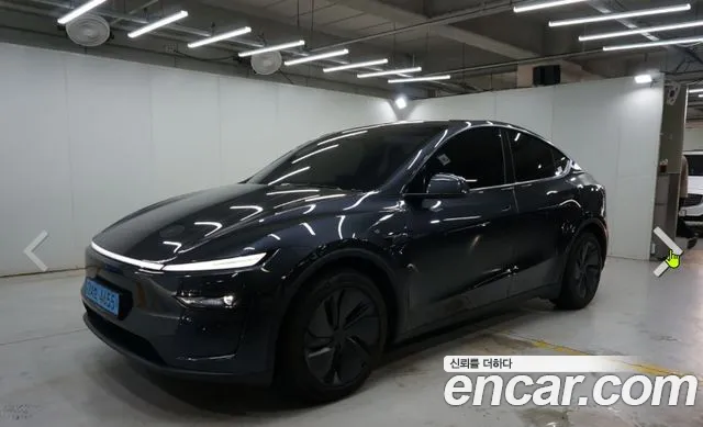 Tesla Model Y — Фото автомобиля 4