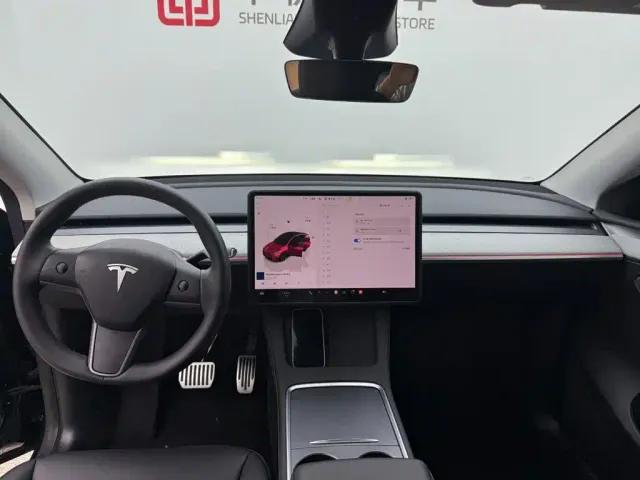 Tesla Model Y — Фото автомобиля 9