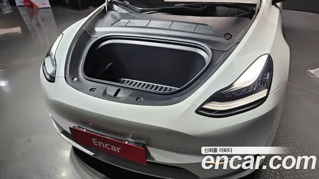 Tesla Model Y — Фото автомобиля 6