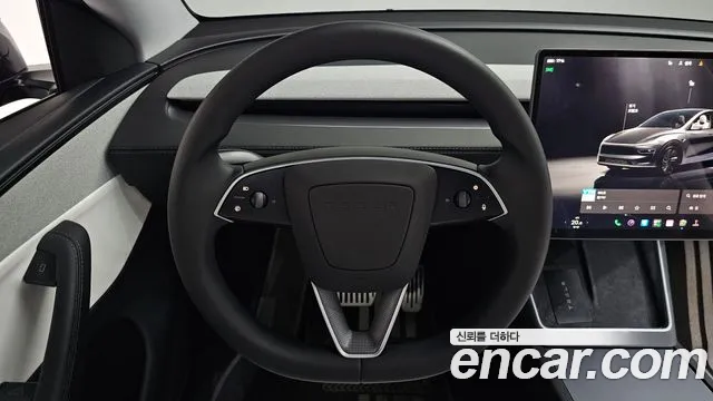 Tesla Model Y — Фото автомобиля 19